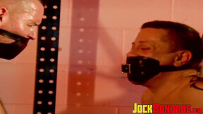 ”Bigg Pete & Dominik Mann are both tied in anguish with their nipples clipped”