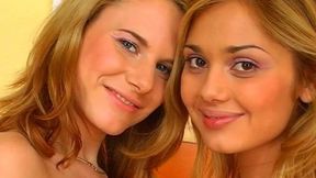 lesbians play with dildo in their pussy