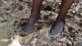 Black stockings in mud, dirty stockings, wet stockings, rip stockings, black stockings