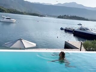 Pretty Monika Fox Swims In nature's garb In Pool In Glamorous Place