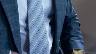 Hunky businessmen sucked and ridden by bearded colleague