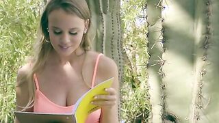 Sitting outside, Alexis Adams dig a private moment to read through her diary and to reflect on her 3-way with