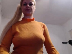 Big tit blonde in a pony tail bounces her boobs up and down