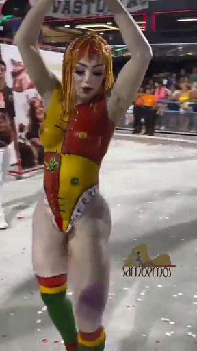 Wrestler in colorful costume performing