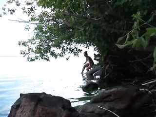 Fishing with harpoon in topless