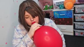 Girl Blowing up 3 Huge Balloons