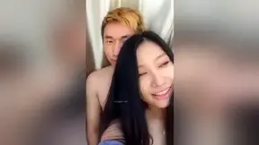 A cute Chinese prostitute rides and sucks on a cock with her hairy twat.