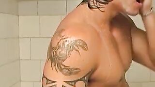 Muscular and hot Brazilian stallion masturbates after shower