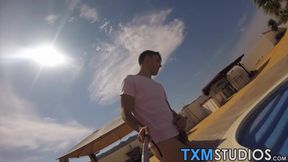 Young amateur strokes his dick and cums loads by the pool