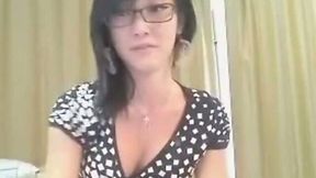 My pretty Asian GF tickles her pussy in front of a webcam