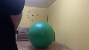 Val play on big green ball