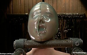 Lesbian in latex mask fights for air