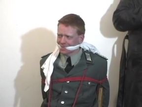 chairtied army officer gagged