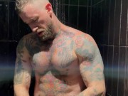 tatted muscle man Troy Daniels jacking off in the shower