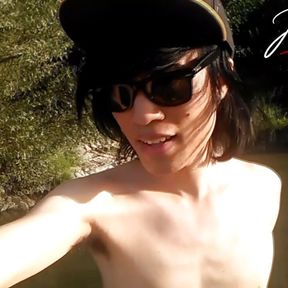 Jon Arteen slim Asian twink boy dancing musical strip-tease on beach smiling showing full pubes outdoor gay porn shoes