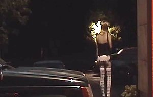 Crossdresser by the car