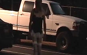 Crossdresser by the car