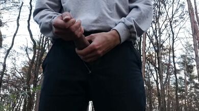 Guy with a massive dick jerks off in the woods alone his load so big.