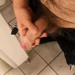 Big uncut bear in public bathroom