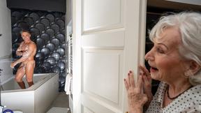 ”70yo gilf joined to bath with her muscled toyboy”