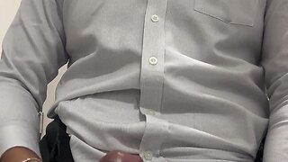 Man masturbating in office bathroom