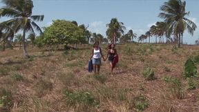 Two sexy tourists fucked in the countryside by a group of men