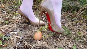 Sexy Aliona crushing 40 eggs with a rodent glue on top of it, by her high heels