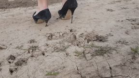 High heels sinking in ground, dirty high heels, high heels stuck, shoes wrecked