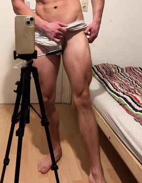 Young bodybuilder posing in boxer shorts