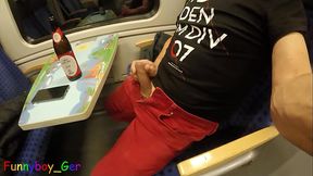 Guy secretly jerks off his sausage in a moving train and then cheekily sprays his cream on the table.