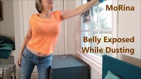 Belly Exposed While Dusting