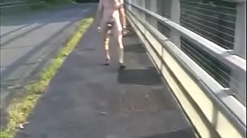 Naked on motorway bridge