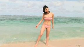 Hungry and horny Mikie Hara plays on a beach showing off her sexy body