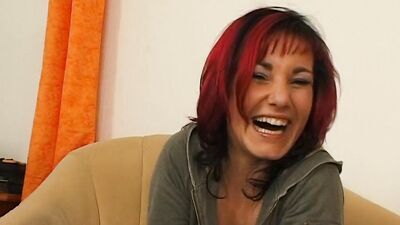 Charming redhead MILF shows her body at porn casting interview