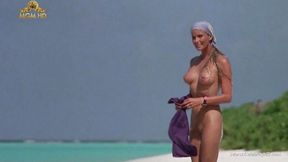 ”Mesmerizing Bo Derek showing off her bushy twat at the beach”