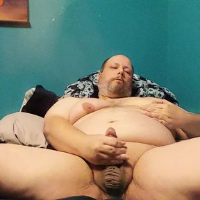 Chubby guy enjoys his body and cums