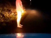 Christmas tshirt and nude. Hiding from traffic at roadside