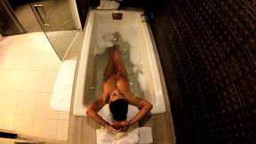 ”Jezebelle Bond shows off her buxom body while showering”