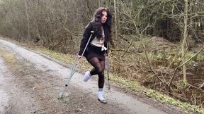Leg cast, walking on crutches, spraied ankle