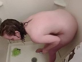 Catching the housewife with a toy in the shower
