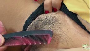 Slender Asian babe with big tits gives a blowjob while holding her lollipop during hot