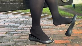 Sunny afternoon walk in ballet flats black tights