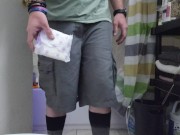 Sissy Nonbinary husband putting an Always Maxi size 5 pad panty liner in his red panties