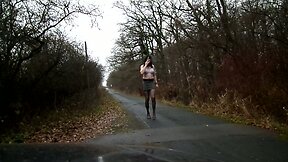 sandralein33 smoking in Bra und short skirt on street