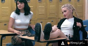 A lesson turns naughty as the teacher disciplines students with a dildo