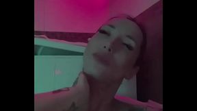 I love to caress myself in the bathroom under the neon lights, whoever shares the bath with me is ready to get into a dogg...