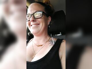 Gal films up her own ebony minidress and teases with her pants in public whilst I'm driving