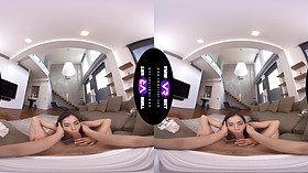 Anastasia Brokelyn strips and gives a sticky footjob in virtual reality