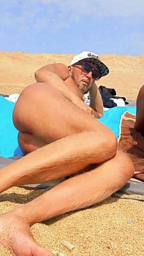Stepmom and stepson on a nudist beach   Clip 3