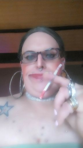 StefanieTs with piercings and tattoos smoking